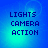 Blue and cyan gradient background with pixelated text "LIGHTS CAMERA ACTION" in dark blue, arranged vertically.