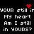 Pixelated text repeats 'YOUR still i' 'MY heart' 'Am I still in YOURS?' with red heart and starburst symbols on black background.