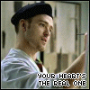 A four- shows a person in a white shirt and dark beret holding an object, with text overlays changing
