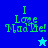 Pixelated green text "I Love Mad Me!" on blue and cyan backgrounds with a star symbol, displayed in four