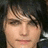 A pixelated image split into two sections: a person with dark hair on the left and blue background text on the right.