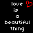 A static pixel art image displays the phrase 'love is a beautiful thing' in white text on black background with red heart symbol replacing 'love'