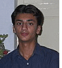 A person in a dark blue button-up shirt appears in a of with varying cropping and background elements