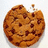 A chocolate chip cookie with a bite taken out, displayed in four identical arranged in a