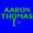 Four display green text 'AARON THOMAS' with a '[=' symbol on blue background, each showing different white rectangular overlays