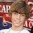 A person with brown hair wearing a white shirt and red gloves, with 'AP' text above and '10' text below, in a static image.