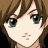 Pixelated anime-style character face with brown hair and green eyes on left, adjacent to black background with white text "Anime IM" above smaller cursive "com" on right.