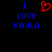 Blue pixelated text "I LOVE KAYLA" on black background with red heart symbol above the word I.
