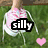 A person wearing pink and white sneakers on grass with text overlays changing from 'silly' to 'goose' then to a smiley face, accompanied by pink hearts.