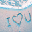 Pixelated icon shows 'I' followed by a heart symbol and 'U' in light blue on a pale background with a sky-like top section.