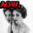 Black-and-white image of a woman with curly hair holding her hand to her mouth, overlaid with red text reading "AOW, Wouldn't it be lovery..." in two