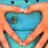 Pixelated blue heart-shaped icon with brown outline against orange background, featuring subtle internal gradients and dark accents.