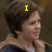 A four- shows a person with short dark hair in a dark blue garment with a light collar, each displaying different yellow pixelated text above the head