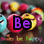 Pixelated image with colorful abstract shapes and text elements, including purple 'Be' and 'Happy' text blocks over a blurred background.