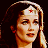 A 2x2 contact sheet of a pixelated Wonder Woman character with text elements on black and gray backgrounds.