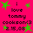 Bright pink background with green star shapes and black text reading 'i love tommy cookson© 2.15.03' arranged in a pattern