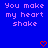 Blue background with pink pixelated text reading 'You make my heart shake' repeated twice, two red pixelated hearts at bottom center and right.