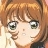 Anime-style character with brown hair and large green eyes, wearing a white top, captured in a close-up crop.