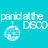 A four- of pixelated text and imagery: top-left shows 'panic at the disco' with a disco ball, top-right features two people in a grainy photo labeled 'boys', bottom repeat 'whoa he is so hot' in white and yellow