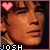 Pixelated portrait of a person with brown hair and light skin, featuring red heart symbols above the head and 'JOSH' text below in blue and white pixel font.