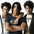 Animated sequence of a person with dark curly hair in various poses, wearing a dark shirt over light clothing against white background.