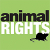 Green background with black and white text reading 'animal RIGHTS' and a black silhouette of a rat below the text.