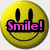 Four yellow smiley face icons arranged in a with pink text overlays reading "Smile!", "The world", "May not love you...", and "But I sure do!"