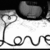 A grayscale icon shows a stylized figure with large eyes and flowing hair, holding a heart-shaped object above its head against a white background.