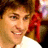 Pixelated image of a person with brown hair and a white shirt, with cyan text 'hot' and '50' on black background.