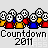 Pixelated 2011 countdown graphic with repeating 'Countdown 2011' text, red/yellow/blue figures holding numbers, and changing celebratory phrases above.