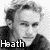 Four celebrity headshots arranged in a with text labels beneath each, displayed on a white background