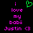 Green heart symbol above pink text reading 'i love my babii Justin <3' on black background.