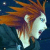Pixelated static image of a stylized character with flowing orange hair against dark blue background, featuring white face and body elements with subtle color gradients.
