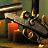 A pixelated image shows a dark-colored vehicle with glowing orange and yellow elements against a muted green background.