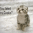 Pixelated static image of a cartoon cat with brown and white fur standing upright on a light gray background.