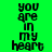 Green background with black pixelated text reading 'you are in my heart' repeated vertically, featuring a pink gradient overlay on the left side.
