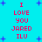 Pixelated text on cyan background with blue stars, repeating 'I LOVE YOU JARED ILU' in red block letters across two