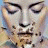 Static image of a classical statue face with closed eyes on left, green text 'Original Icons .com' on right against dark background.