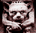A stone gargoyle-like creature with large ears and a crown of spikes, shown in where its eyes glow red while the rest remains monochrome