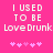 Pixelated text on bright pink background with two identical text blocks and pink star-like symbols below each block.