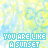 A static image with a repeating pattern of light blue and yellow floral shapes on a white background, overlaid with repeated text in cyan pixelated font.