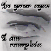 A grayscale animated sequence showing a human eye with text above and below it, the eye blinks and shifts slightly across frames.