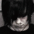Five grayscale portrait of a person with dark hair in various poses and expressions, arranged in two on a light background