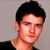 Static 50x50 pixel buddy icon showing a close-up of a person's head and shoulders with dark hair against a plain gray background.