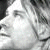 A contact sheet of 12 animated frames showing a black-and-white photo of Kurt Cobain's face alongside repeated text "Kurt Cobain" in various pixelated styles and color variations on a black background.