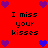 Red background with black text reading "I miss your kisses" and purple/blue pixelated hearts arranged in a pattern