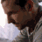 Four pixelated show a person's head and shoulders in different poses against a light background, with visible clothing details