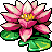 Pixelated flower with pink and white petals, yellow center, and green leaves on a gray background.