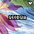 nine identical pixelated images showing a flower with purple petals, blue water-like background, and green foliage. Each image contains the text "GEORGIA" in black block letters over the center