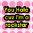 Pixelated text phrases on a pink polka-dot background with a gray rectangle in the bottom-right corner.